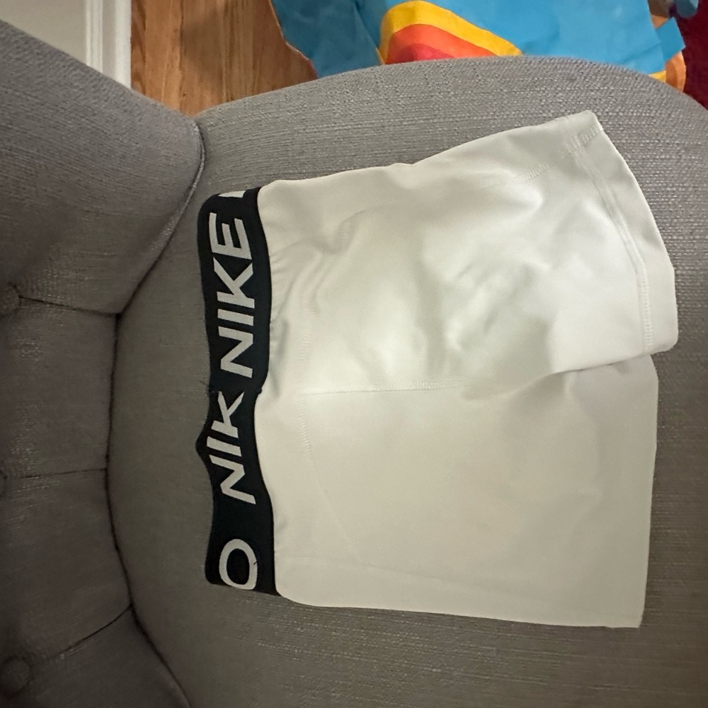 White Nike shorts